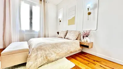 Letto o letti in una camera di Appartamento d’arte, L’OASI