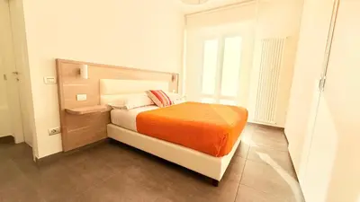 Letto o letti in una camera di Appartamento Letizia