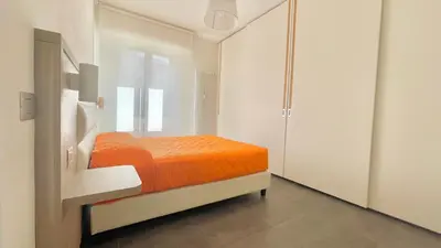 Letto o letti in una camera di Appartamento Letizia
