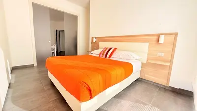 Letto o letti in una camera di Appartamento Letizia