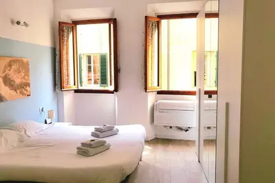 Letto o letti in una camera di Macci Florence Sweet Apartment