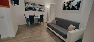 Area soggiorno di Macci Florence Sweet Apartment