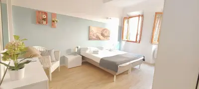 Letto o letti in una camera di Macci Florence Sweet Apartment