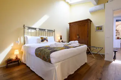 Letto o letti in una camera di Cozynest
