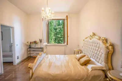 Letto o letti in una camera di Majestic Villa in Hills of Florence with Gardens Gym Jacuzzi and Sauna