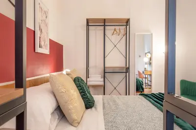 Letto o letti in una camera di Wine Apartments Florence Prosecco