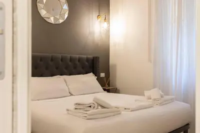Letto o letti in una camera di Ghibellina Comfort Apartment