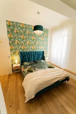 Letto o letti in una camera di Liberty Seasons