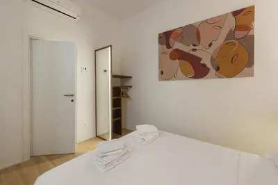 Letto o letti in una camera di Anguillara Full Design by Mmega