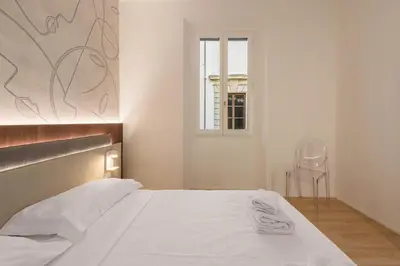 Letto o letti in una camera di Anguillara Full Design by Mmega