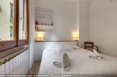 Letto o letti in una camera di Salterelli Apartments by Mamo Florence