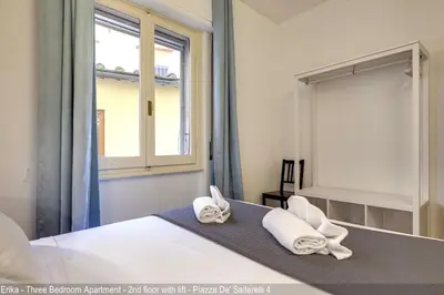 Letto o letti in una camera di Salterelli Apartments by Mamo Florence