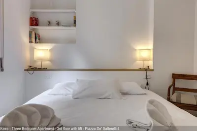 Letto o letti in una camera di Salterelli Apartments by Mamo Florence