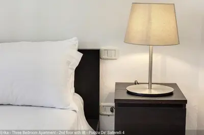 Letto o letti in una camera di Salterelli Apartments by Mamo Florence