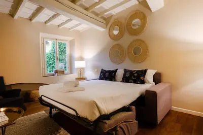 Letto o letti in una camera di Santa Croce Charming Apartment