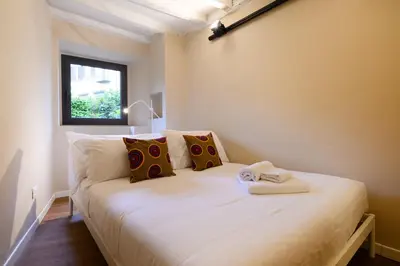 Letto o letti in una camera di Santa Croce Charming Apartment