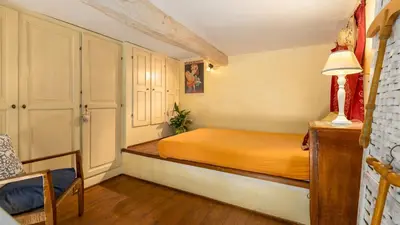 Letto o letti in una camera di VILLA TREGGIAIA 12&2, Emma Villas