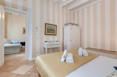 Letto o letti in una camera di Agnolo Apartment by Mamo Florence