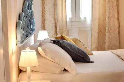 Letto o letti in una camera di Agnolo Apartment by Mamo Florence