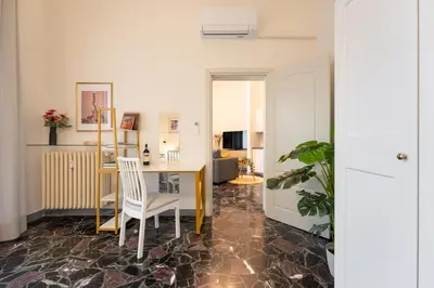 TV o dispositivi per l'intrattenimento presso Keys of Italy - Monaco 9 - 2 bedrooms flat nearby the Train Station