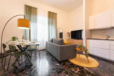 TV o dispositivi per l'intrattenimento presso Keys of Italy - Monaco 9 - 2 bedrooms flat nearby the Train Station