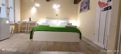 Letto o letti in una camera di Appartamento Mughetto