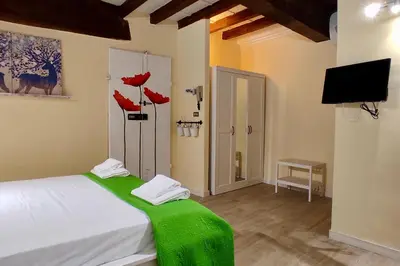 Letto o letti in una camera di Appartamento Mughetto