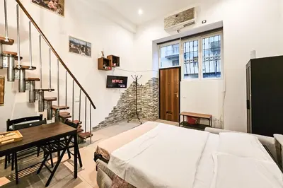 Letto o letti in una camera di Casa Patrizia Firenze