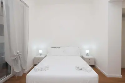 Letto o letti in una camera di CITTADELLA LUXURY APARTMENTS