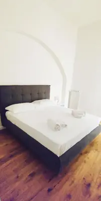 Letto o letti in una camera di CITTADELLA LUXURY APARTMENTS