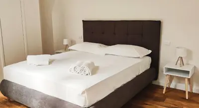 Letto o letti in una camera di CITTADELLA LUXURY APARTMENTS