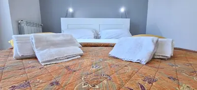 Letto o letti in una camera di Casa Margarita