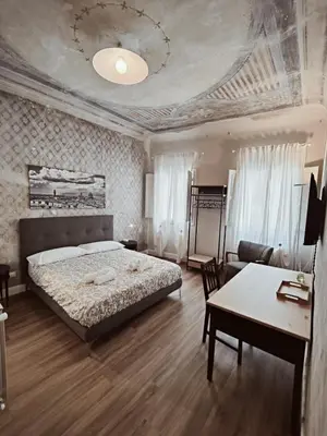 Letto o letti in una camera di Amazing Florence Rooms