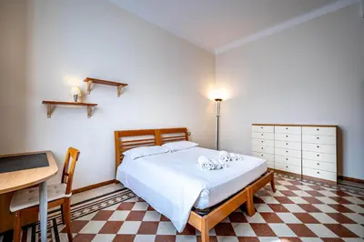 Letto o letti in una camera di YD elegant near tramvia