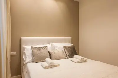 Letto o letti in una camera di Dolce Vita Apartament