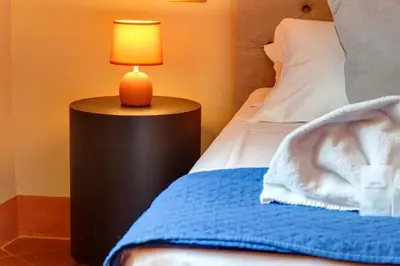 Letto o letti in una camera di Tintori Luxury Palace by Mamo Florence