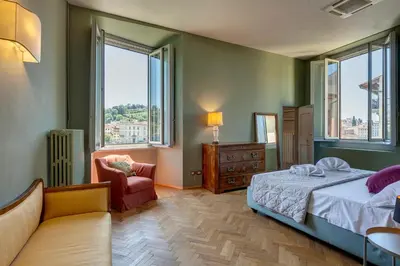 Letto o letti in una camera di Tintori Luxury Palace by Mamo Florence