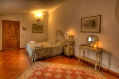 Letto o letti in una camera di Villa Luciano