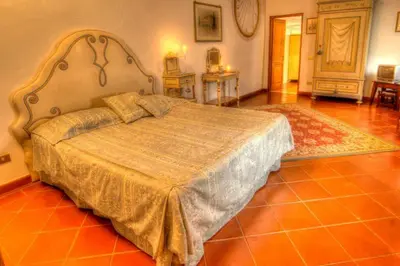 Letto o letti in una camera di Villa Luciano