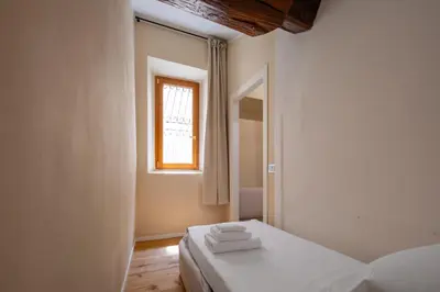 Letto o letti in una camera di Palazzina Fusi
