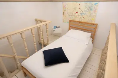 Letto o letti in una camera di Santo Spirito Frescoed 6 sleeps apartment