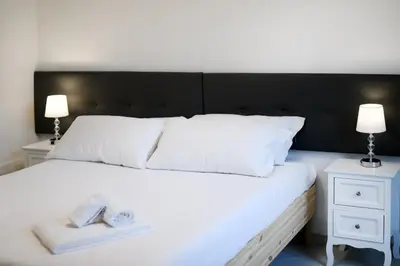 Letto o letti in una camera di Angelico Comfort Apartament