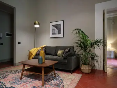 Area soggiorno di Charming & Authentic 1BR in Florence Historic Center, Near the Duomo