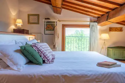 Letto o letti in una camera di Casale le Muracce