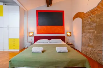 Letto o letti in una camera di Duomo Sweet