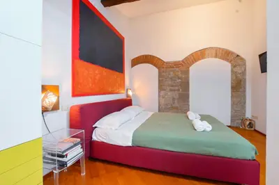 Letto o letti in una camera di Duomo Sweet
