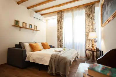 Letto o letti in una camera di Casa Sorelle Flo - Flo Apartments