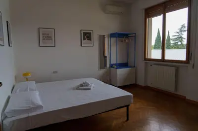 Letto o letti in una camera di Fanciful 2-BR outside ZTL