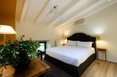 Letto o letti in una camera di Duomo Luxury Apartment with plunge pool