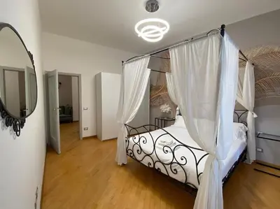 Letto o letti in una camera di Sara Home Florence